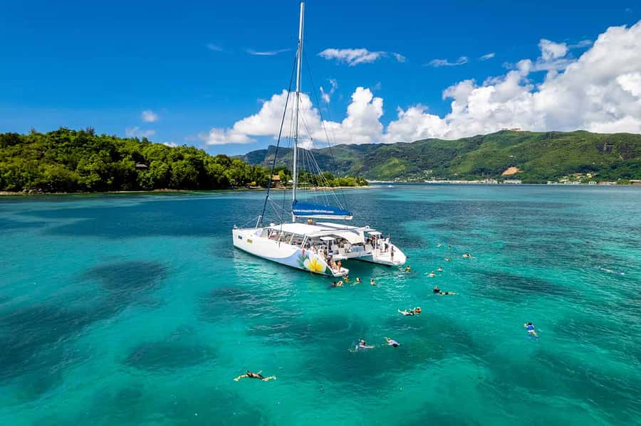 Mahé: Saint-Anne Marine Park and Moyenne Island Cruise - The catamaran, seating, and day at sea